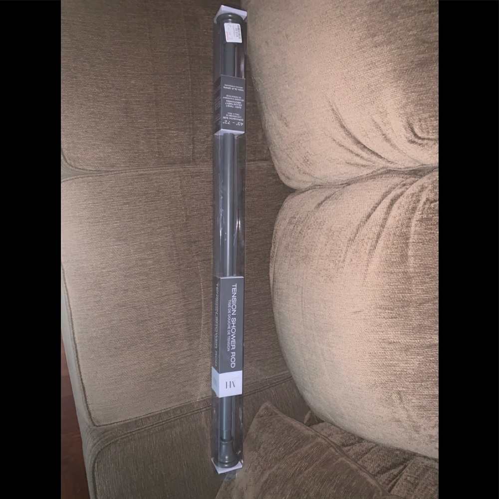 Tension shower rod